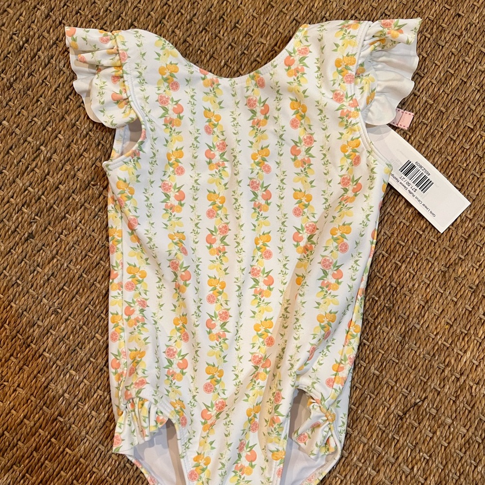 NWT. Minnow Citrus Swim. Size 2T.